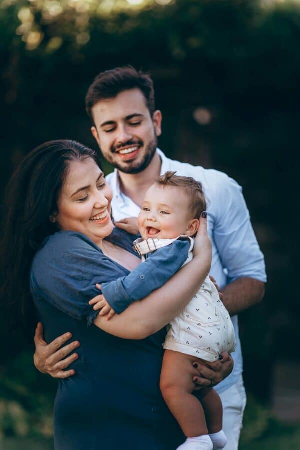 parents holding their baby